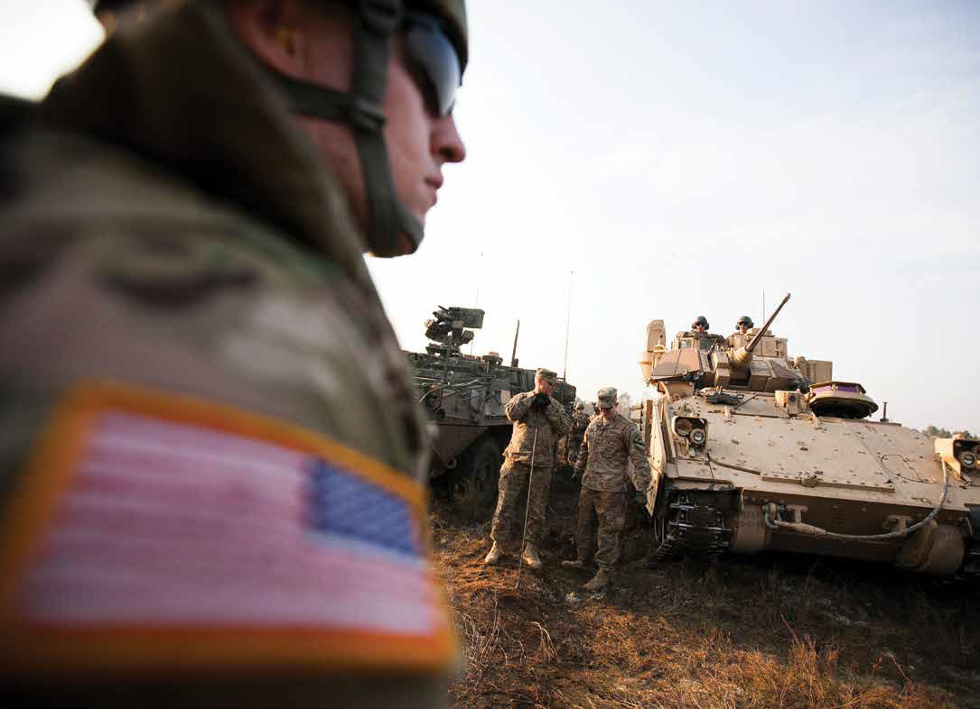 Photo of soldier and tank