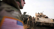 Photo of soldier and tank
